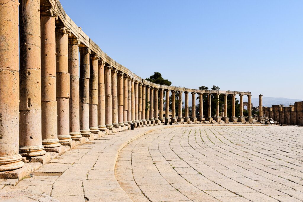Explore the ancient Roman architecture of Jerash, Jordan, showcasing well-preserved columns and the iconic Oval Plaza.