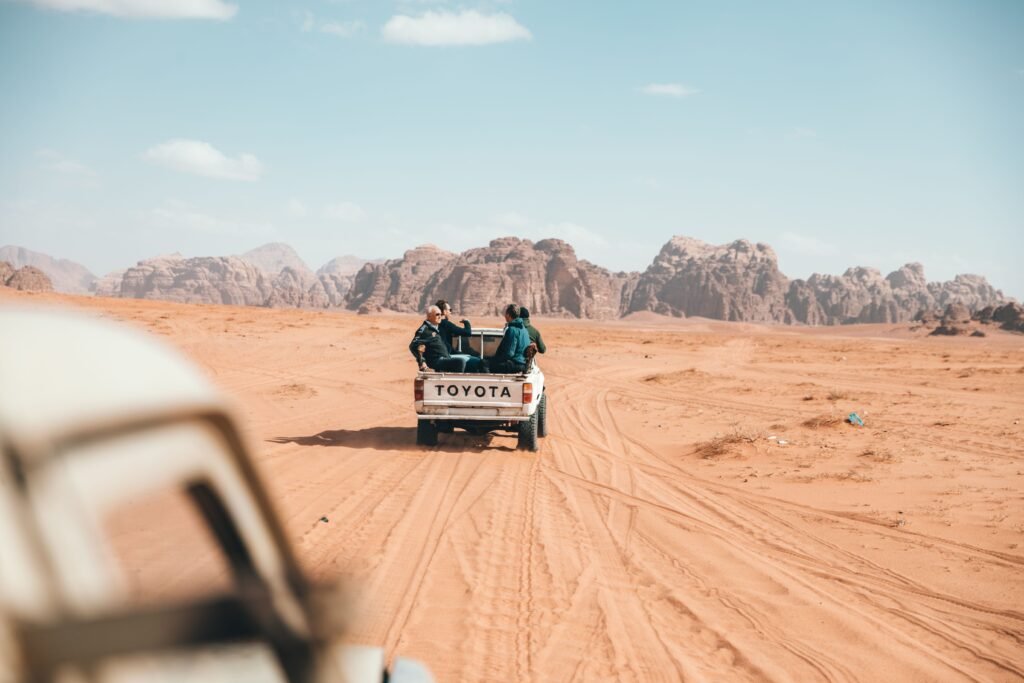 Private transfer car on the road to Petra and Wadi Rum Jordan